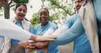 Volunteer, people or hand stack in park for community service, green project or conservation success. Applause, positive impact or team celebrate for trash pickup, ngo or nature protection from below