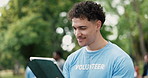 Tablet, man and volunteer in nature with planning for social responsibility, ngo or charity event. Thinking, outdoor and person with digital technology for checklist for community outreach in park.