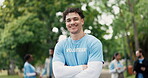 Face, volunteer or man in park with arms crossed for eco project, outreach or nonprofit service. Confident, person outdoor and charity work for sustainability program, social responsibility or bokeh.