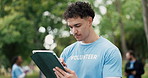 Tablet, man and volunteer in park with planning for social responsibility, ngo or charity event. Thinking, nature and male person with digital technology for checklist for community outreach outdoor.
