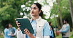 Tablet, woman and ngo worker outdoor with planning for social responsibility, volunteer or charity event. Thinking, nature and person with technology for checklist for community outreach in park.