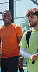 Padel friends, team and walking to court for match practice, start game training or tournament. Begin, people and talking outdoor for tennis competition, sports workout and ready for fitness exercise