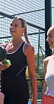 Padel friends, women and walking to court for practice arrival, start game training or tournament. Begin, people and talking outdoor for tennis competition, sports workout and ready for match fitness