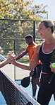 Padel, fitness and handshake with people on court for competition, respect and tournament training. Sports athlete, teamwork and tennis player match with friends on outdoor turf for challenge