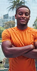 Face, man outdoor and fitness with arms crossed for tennis match, practice and sports training. Active, black person and smile in city with exercise confidence, wellness and ready for padel workout.