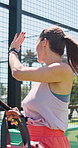 Woman, wave and padel court with greeting for friends, sports tournament and competition practice. Athlete club, exercise and outdoor workout with gym bag, group and community for friendly match
