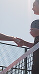 Padel, team and handshake with people on court for competition, respect and tournament training. Sports athlete, low angle and tennis player match with friends shaking hands outdoor for challenge