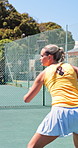 Fitness, game and training with woman on tennis court for competition, match or tournament. Exercise, form and technique with athlete or player outdoor for practice, sports or workout session