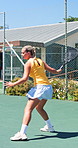 Exercise, game and training with woman on tennis court for competition, match or tournament. Fitness, form and technique with athlete or player outdoor for practice, sports or workout session