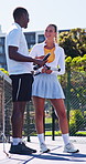 Fitness, man and woman in tennis court with conversation, bonding or sports advice for training match. Team, padel or athlete outdoor with racket, discussion or motivation in performance tips.