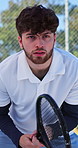 Tennis, ready and man with racket on court for match, training or workout for serving with energy. Fitness, breathing and male athlete preparing for sports game, practice or exercise outdoor.