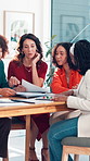 Office, business women and meeting with paperwork for brand proposal, idea and feedback. Happy team, planning and discussion with document for advertising campaign, brainstorming strategy or project