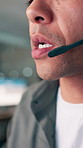 Telecom, man or mouth in office with discussion for technical support, client advice or explain info. Bokeh, person lips or talk in online meeting for customer service, help desk or CRM consultation.