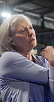 Gym, senior woman or arm stretching for retirement fitness, workout preparation or wellness practice. Sports club, warm up exercise or old person with breath for body mobility, start or getting ready