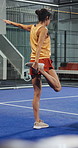 Padel, coach or senior women stretching on indoor court, workout preparation or wellness practice. Back, warm up exercise or people with balance challenge, retirement fitness or tennis instructor