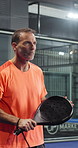 Exercise, game and padel with mature man on court for challenge, competition or tournament. Fitness, technique and tennis with player person at sports venue for form, practice or training session