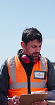 Clipboard, conversation and logistics with man outdoor on commercial dock for shipping schedule. Delivery, distribution and paperwork with people talking in harbor for supply chain management