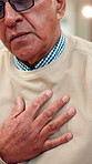 Cough, sofa and senior man with chest pain in home for cardiac arrest, heartburn or panic attack. Sick, medical emergency and elderly person in living room with viral infection symptoms in house.