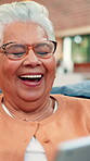 Joke, laughing and tablet with old woman on sofa for social media meme, streaming video or comedy. Online funny post, digital update or retirement with senior person and scroll in living room of home