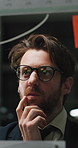 Man, thinking and brainstorming at glass wall for idea planning, marketing campaign or project. Person, glasses and reflection in office with sticky note for problem solving, creative vision or goal.