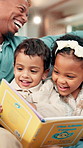 Children, reading and home with parents, learn and bonding with book for cognitive growth in lounge. Man, laugh and dad with kids in living room, story and siblings with language development in house