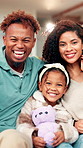 Happy family, face and laughing with hug for love, bonding or weekend together in home. Portrait, mom and dad with daughter, child or teddy bear for childhood care, safety or security in house