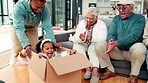 Father, child and push box in new home with family clapping, real estate celebration and excited. Cardboard, game and play with kid for moving in house, generations and applause with grandparents