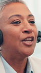 Call center, headset and woman in office, advice or contact us with communication. Mature person, consultant or employee with customer support, crm or system solution with help desk or online service