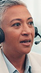 Call center, headset and woman in office, consultation or communication with system solution. Mature person, online service or employee in workplace, crm or customer support with help desk or talking