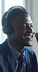 Telemarketing, talk and happy black man in call center for insurance, lead generation or policy sale. Business, headset and broker speaking in office for telesales, coverage inquiry or communication