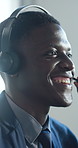 Contact us, talk and happy black man in call center for banking, financial support or crm. Business, headset and agent speaking in office for account assistance, loan inquiry or customer service