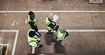 Above, team and discussion in warehouse for distribution, supply chain planning or shipping. Top view, people and talk in storehouse for logistics, stock checklist or walk with manager for inspection