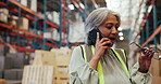 Mature woman, frustrated and phone call in warehouse for shipping delay or storage issue in depot. Female person, executive or inventory manager talking with mobile smartphone for supply chain fail