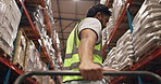 Trolley, handle and hand of supply chain worker in warehouse for cargo, industrial or freight delivery. Distribution, pallet jack and male logistics employee with inspection for shipping from below.