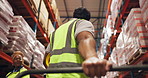 Trolley, handle and hand of logistics worker in warehouse for cargo, industrial or freight delivery. Distribution, pallet jack and male supply chain employee with inspection for shipping from below.