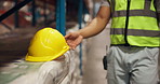 Hands, helmet and warehouse inspection with logistics, shelf and safety check with inventory management. Person, engineer and walk with ppe, hardhat and career with shipping at distribution plant