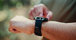 Hands, man outdoor or scroll with smart watch for fitness app, tracking heart rate or exercise progress. Bokeh, person or tap with tech in nature for workout results, wellness update or step counter.