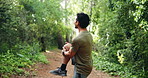 Man, runner or stretching with legs in nature for workout preparation or outdoor exercise. Fitness, active or male person getting ready with warm up for trekking, hiking or training on forest path