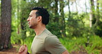 Fitness, workout and man in nature with running, cardio exercise and training on international trip. Body wellness, bokeh and athlete in forest with jog, outdoor trail and endurance in Costa Rica.
