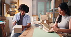 Distribution, scanner and people with laptop, teamwork and online order with inventory. Employees, man and woman in workplace, computer and delivery schedule with logistics, supply chain and internet