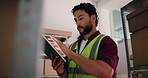 Courier, tablet and shelf with man in warehouse for delivery information, shipping details or logistics. Online shopping startup, distribution shipment and low angle with person for ecommerce postage