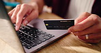 Hands, credit card and man with laptop, online shopping and internet banking with transactions. Closeup, computer and person with payment, eft purchase and fintech with ecommerce and discount deal