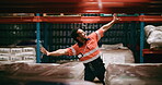 Logistics, dance or happy man in storage warehouse for shift finish, shipping or weekend celebration. Stock distribution, excited or worker with energy for freedom, supply chain success or good vibes