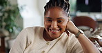 Happy, sofa and face of black woman in home to relax, resting and free time on weekend. Apartment, living room and portrait of person with smile, laugh and chill on couch for calm, wellness and peace