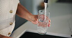 Glass, water and tap with hands of woman in kitchen of home for detox drinks, mineral hydration and health. Electrolytes, wellness and aqua with person and faucet in apartment for liquid and beverage