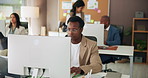 Computer, creative and business man in office for publishing, online article and research. Coworking, magazine agency and person on pc for proofreading news report, copywriting and editing review
