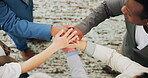 Above, business people or hands together in office with success for company objective, goal or target. Happy team, huddle and celebration in workplace with applause for unity, solidarity and synergy.