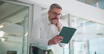 Businessman, tablet and reading in office with finance report, budget review and statement. Mature, accountant and thinking with tech at firm for financial audit and company performance evaluation