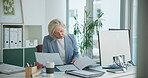 Business woman, documents and typing with research in office for audit, budget accounting and report. Planning, paperwork and computer with mature employee in finance agency for analysis or review