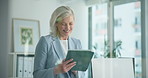 Financial advisor, tablet and woman in office, smile and typing with digital app for profit growth. Mature person, investor or employee in workplace, tech and revenue increase with email for b2b deal